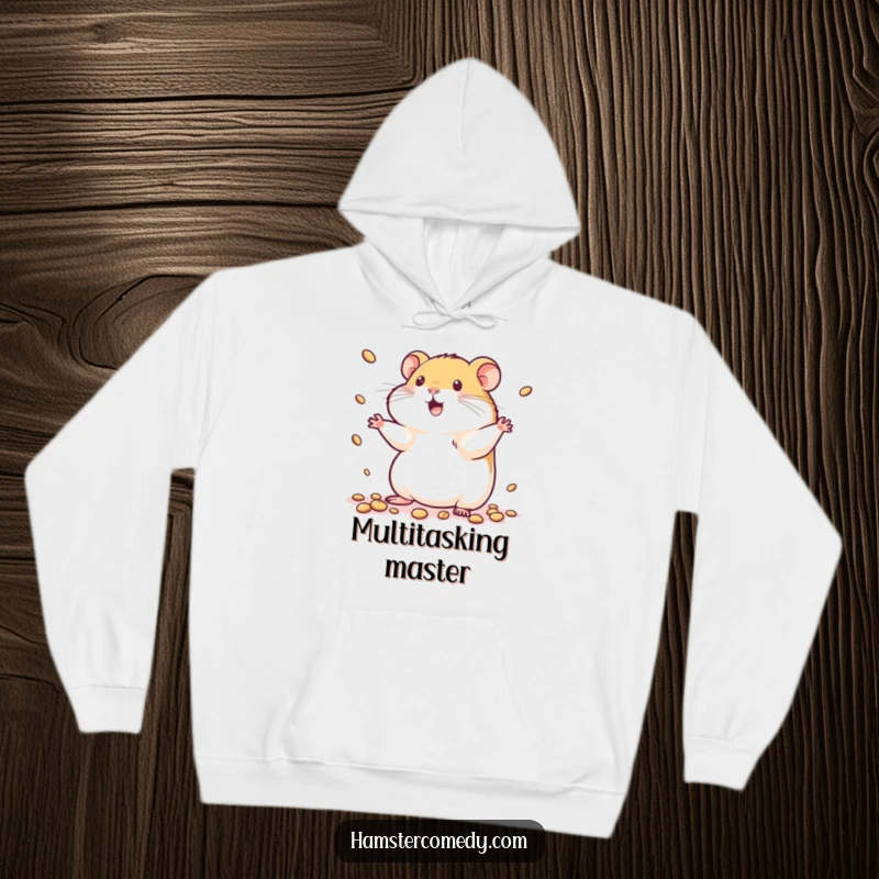 Funny kawaii hamster hoodie showing a cute hamster playfully juggling small seeds, full of energy and a cheerful smile.