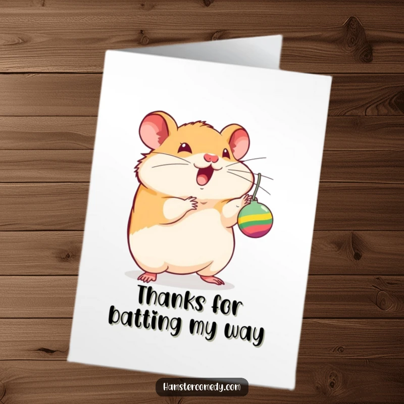 Funny Free Printable Thank You Card: An excited hamster energetically batting at a toy, showing thanks with playful paws.
