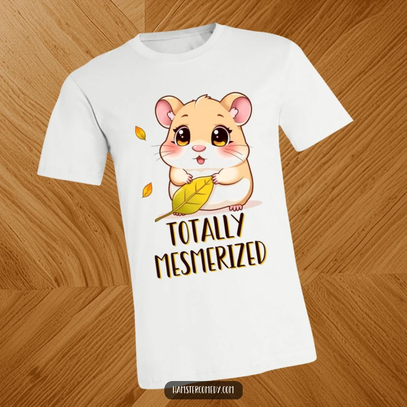 Funny Kawaii Hamster T-Shirt: Adorable small hamster with big, curious eyes observing a falling autumn leaf, expressing innocent wonder and joy.